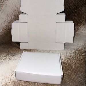 30 white small boxes 6” x 6” x 4”